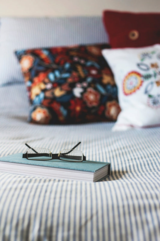 Why Do So Many People Love Reading in Bed?